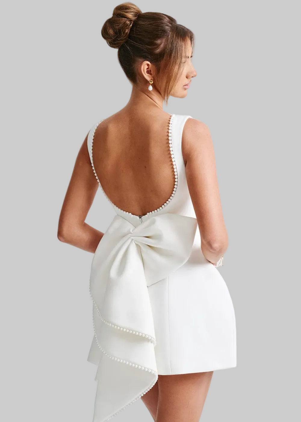 Open-back mini dress with bow detail for women | Elowyn