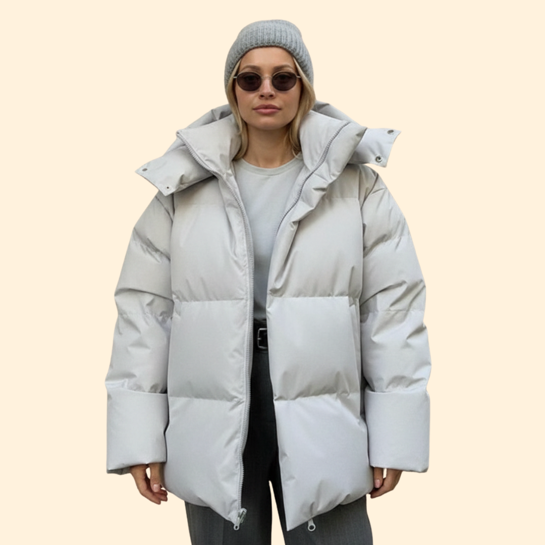 Quilted high-collar jacket with elongated silhouette for women | Eloria