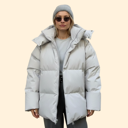 Quilted high-collar jacket with elongated silhouette for women | Eloria