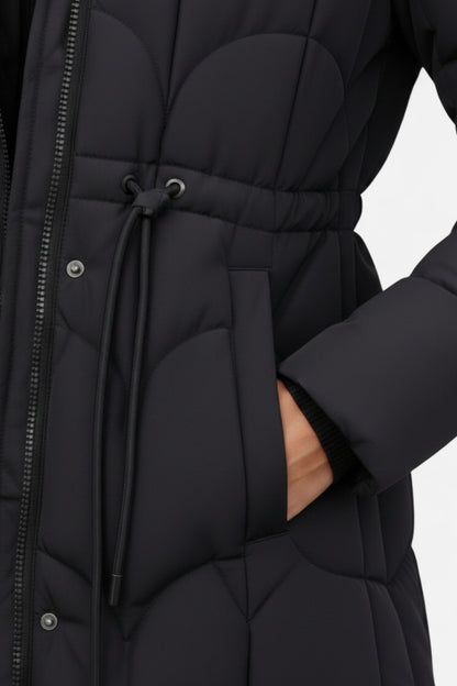 Long hooded puffer coat with drawstring waist for women | Caurelle
