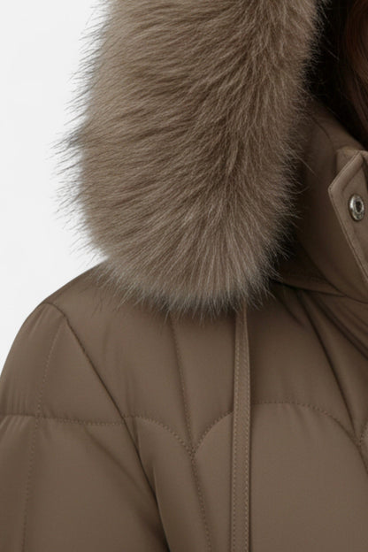 Long hooded puffer coat with drawstring waist for women | Caurelle