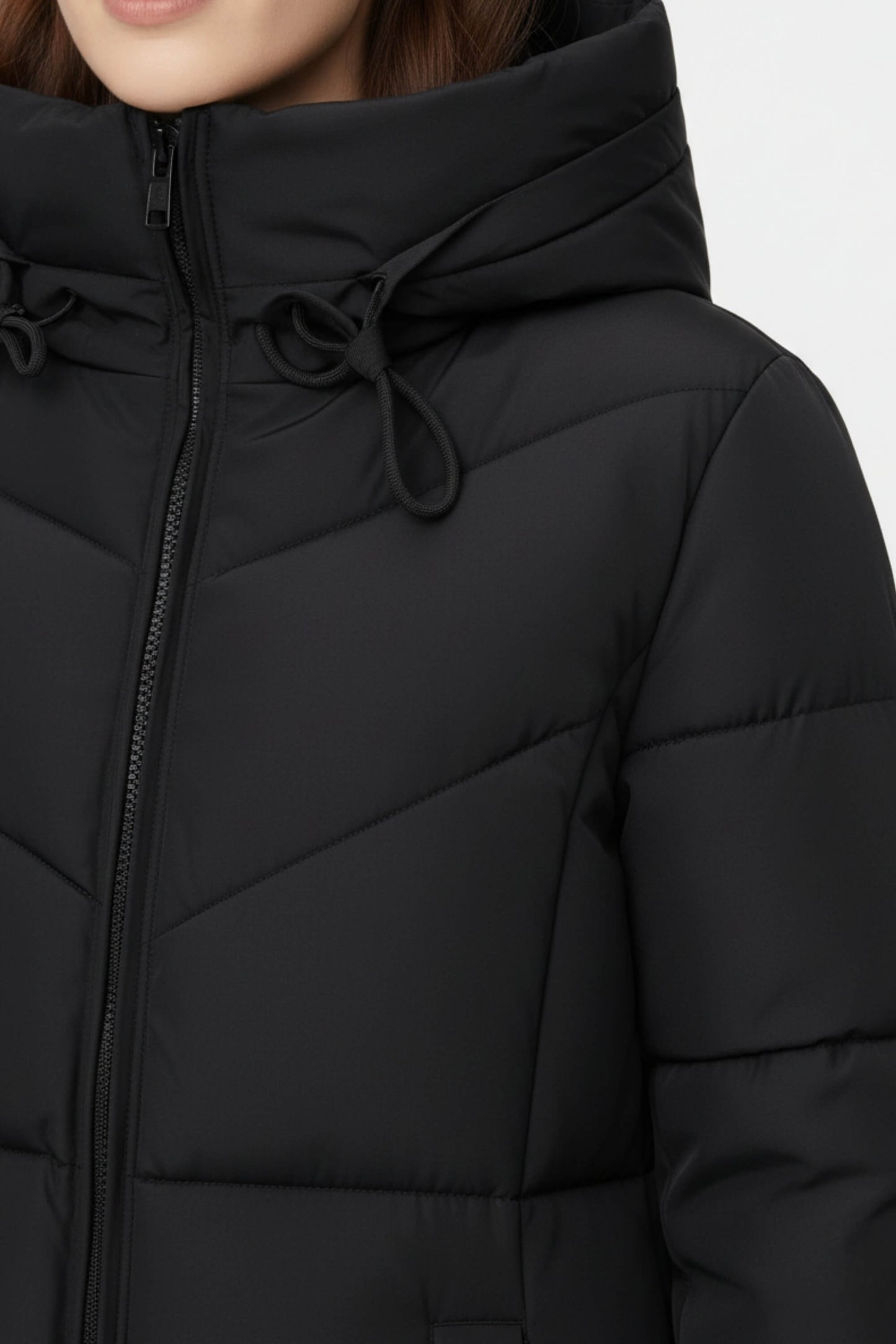 Long hooded puffer coat with streamlined silhouette for women | Caurelle