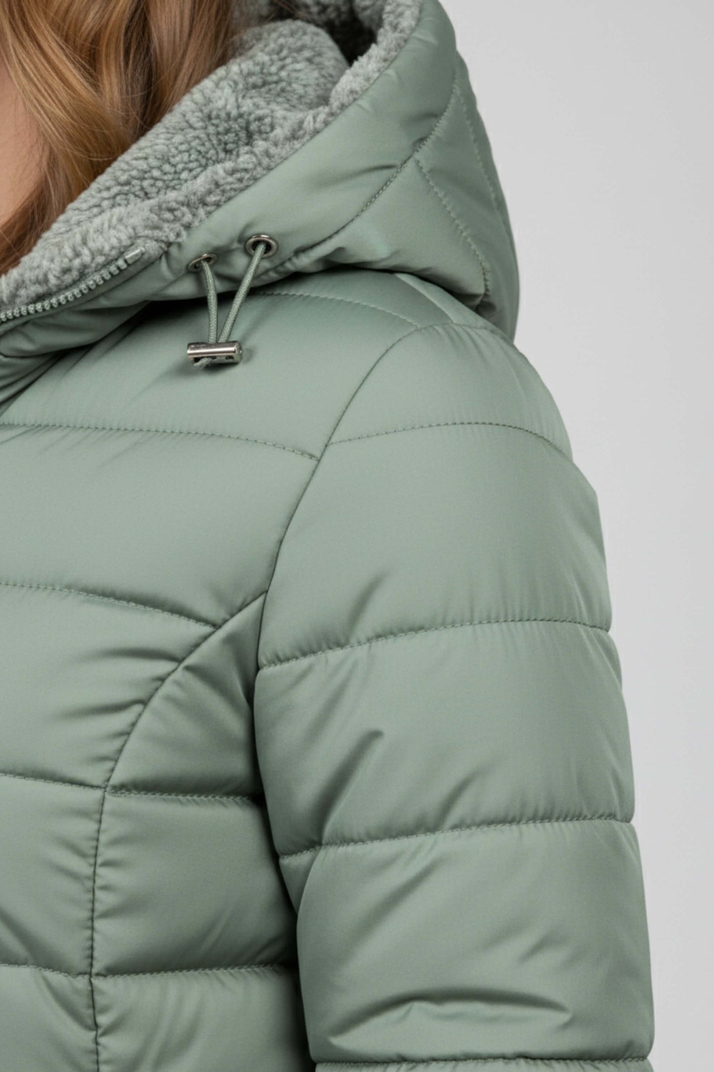 Long quilted puffer coat with high collar for women | Caurelle